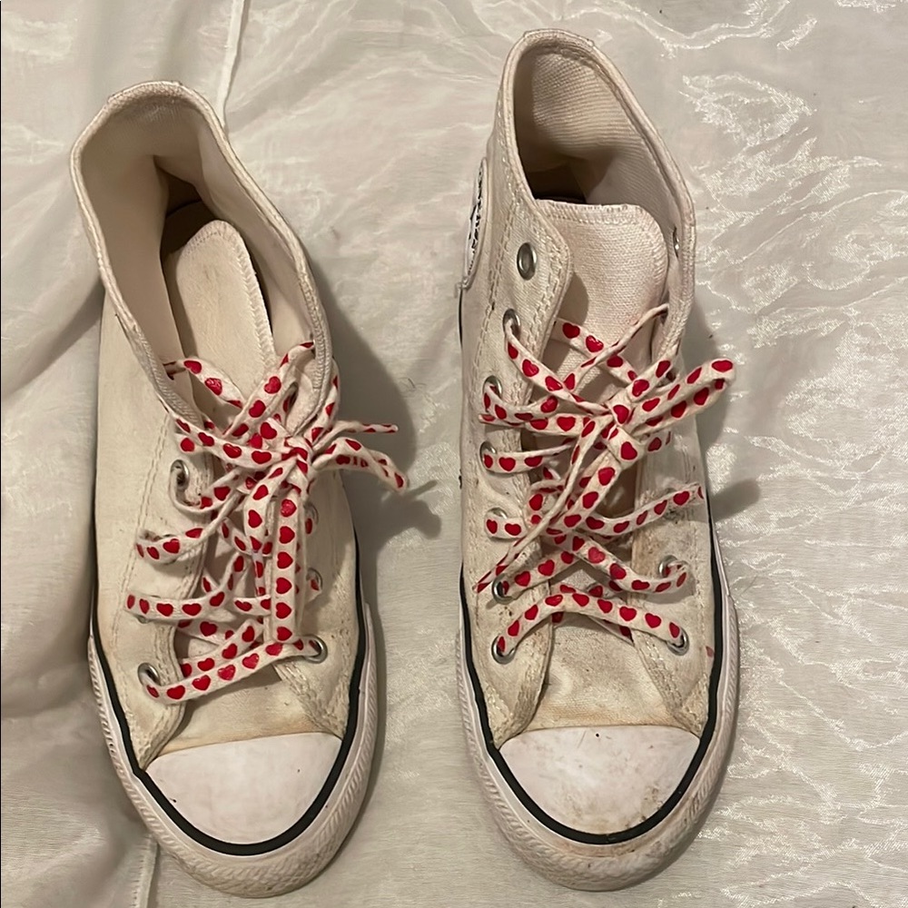 Converse heart made with love sneakers.